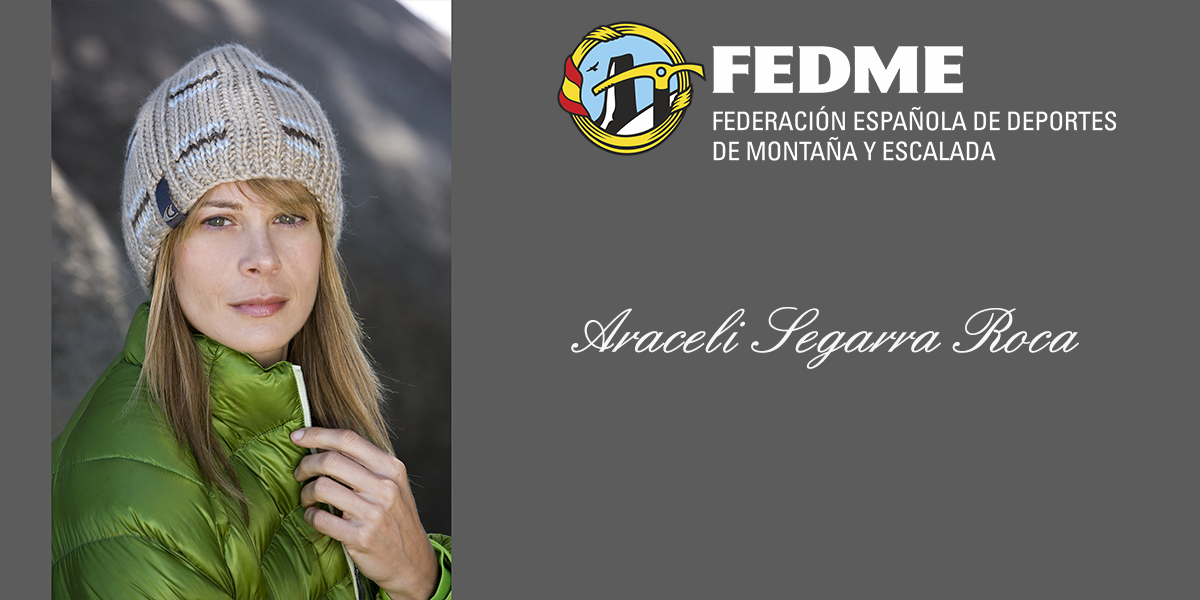 Foto de portada: A la izquierda un primer plano de Araceli Segarra con gorro de lana beig y chaqueta de plumas verde. A la derecha el logo de la FEDME y bajo el nombre de Araceli Segarra Roca